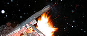 Bild - 30 - das Abendliche Feuer bei leichtem Schneetreiben 